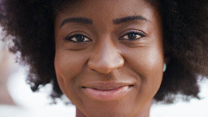 Portrait of attractive black female smiling to camera 