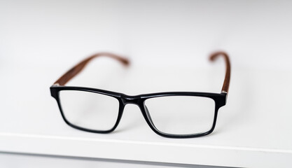 Eyeglass lenses close up view. Eyewear correction stylish frame with glasses.