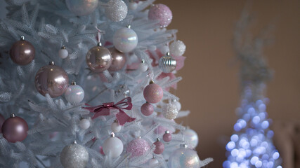 White Christmas tree with colorful balls.