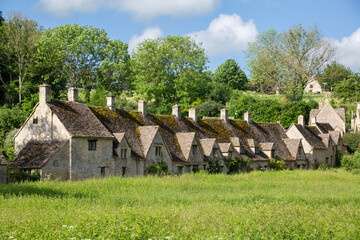 Fototapeta na wymiar famous traditional houses at Arlington row in the parish of Bibury, Gloucestershire during summer