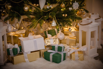 Various Christmas gifts under the tree