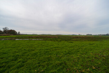 Fototapeta na wymiar Landscape picture of a ditch and farmlands