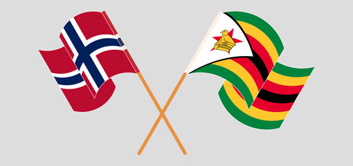 Crossed and waving flags of Norway and Zimbabwe