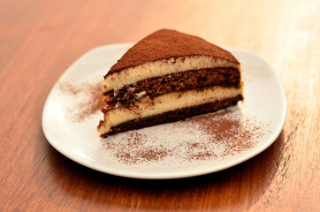 tiramisu plate on wooden table