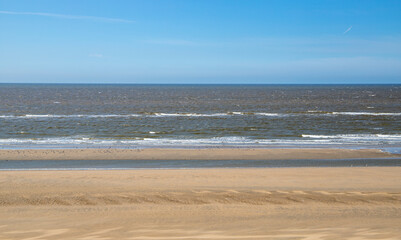 Fototapeta na wymiar Empty beach on sunny day