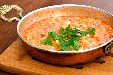 eggs tomatoes green pepper in pan