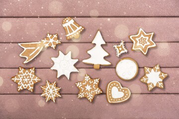 Set of tasty Christmas gingerbread cookies on the desk