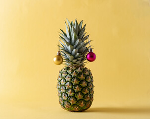 Pineapple tree and Christmas decorations. New Year's concept