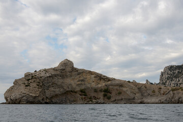 Fototapeta premium Crimean Black Sea coast, landscape sea, mountains and sky, the concept of travel and tourism on the Crimean peninsula
