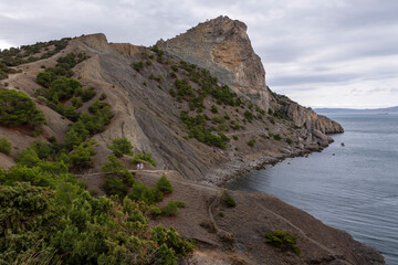 Crimean Black Sea coast, landscape sea, mountains and sky, the concept of travel and tourism on the Crimean peninsula