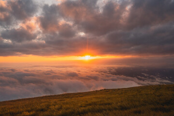 Plakat sunset above the clouds