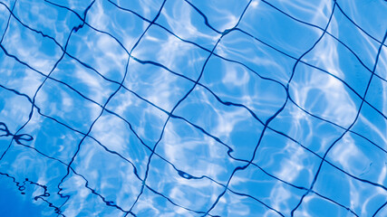 Clear water surface. Blue wave texture, pool water background. Abstract summer sea pattern.