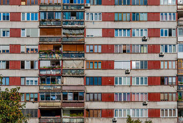 Sarajevo, Bosnia-Hercegovina, 12 September 2015. Exterior view of a run-down apartment block on Bulevar Meše Selimovića still bearing the scars of the war and siege of Sarajevo.