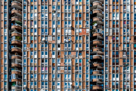 Sarajevo, Bosnia-Hercegovina, 12 September 2015. Exterior view of a run-down apartment block on Bulevar Me&scaron;e Selimovića still bearing the scars of the war and siege of Sarajevo.