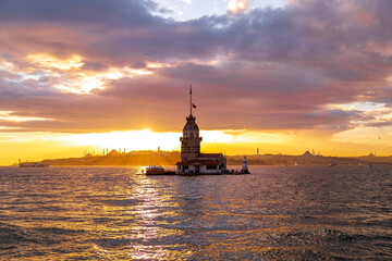 Maidens Tower at sunset, İstanbul. Beautiful clouds with blue sky. Historical light house of...