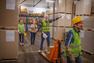 Group of workers working in a warehouse.