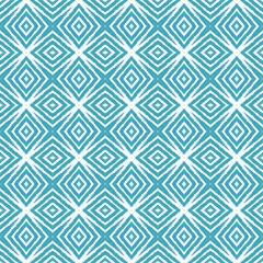 Ikat repeating swimwear design. Turquoise