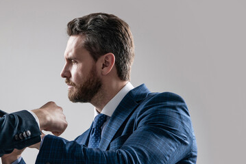 Professional employee man got in physical fight grey background, fighting