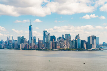 Aerial panoramic city view of Lower Manhattan area over, New York City, USA. Bird's eye view from helicopter of metropolis skyline. A vibrant business neighborhood.