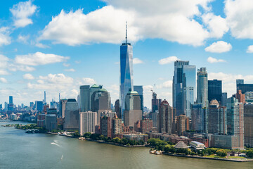 Obraz premium Aerial panoramic city view of Lower Manhattan district, New York, USA. Bird's eye view from helicopter of metropolis cityscape. Hudson River and West Side area of international megalopolis.