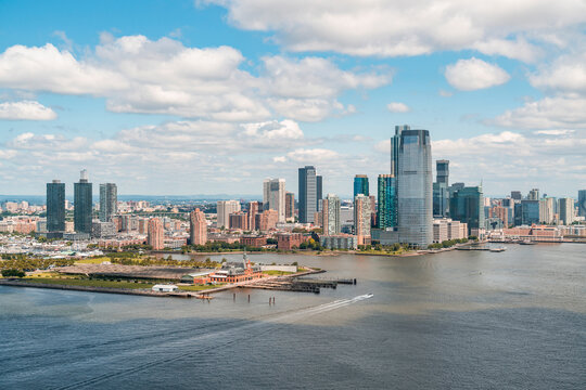 Aerial panoramic city view of New Jersey City financial Downtown skyscrapers. Bird's eye view from helicopter. Jersey city is an important transportation center for the Port of New York and New Jersey