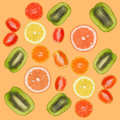 Seamless pattern with slices of orange, lemon, kiwi, grapefruit on an orange background