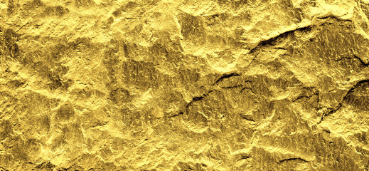 Gold grunge background. Gold stone background with copy space.