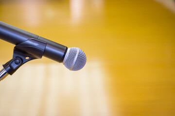Fototapeta premium Close up of microphone on a podium in an auditorium