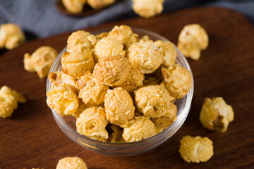 popcorn in a bow  on wood background