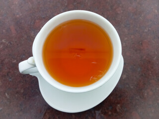 White organic green tea cup on table, close view