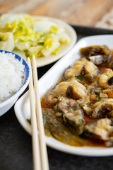 angle view fast food of steamed Tang Yu with cabbage and rice vertical composition
