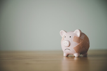 Piggy bank on wood table. Financial investment and save money concept