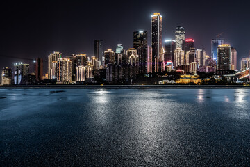 Panoramic skyline and modern commercial buildings with empty road. Asphalt road and cityscape at...