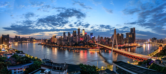 Panoramic skyline and modern commercial buildings in Chongqing at night