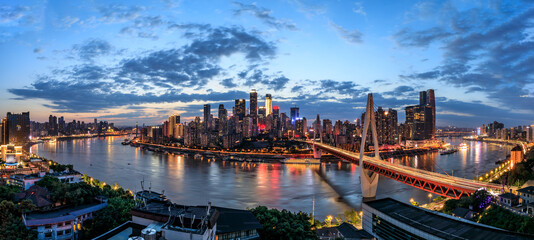 Naklejka premium Panoramic skyline and modern commercial buildings in Chongqing at night