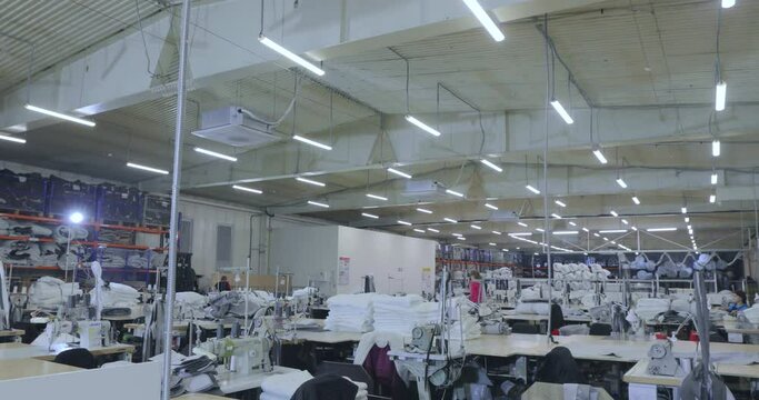 An empty sewing workshop. Panorama of a large sewing workshop. Large sewing production