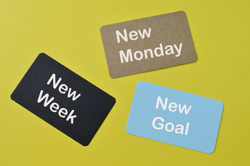Colorful cards with text NEW MONDAY, NEW WEEK and NEW GOAL