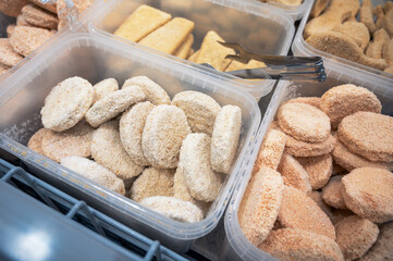 Frozen fish semifinished in fridge at the fish market. Healthy eating and fish market concept