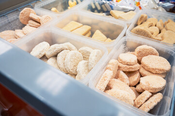 Frozen fish semifinished in fridge at the fish market. Healthy eating and fish market concept