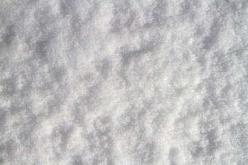 Close-up of snow. Grainy texture of snow.