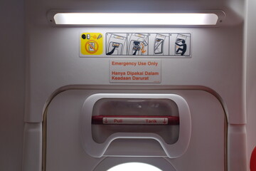 An emergency door in the aircraft cabin that will be used in the event of a situation that...