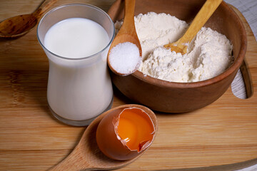 ingredients for baking with flour milk and eggs