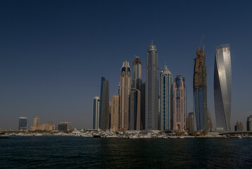 Fototapeta na wymiar city scape of Dubai, tall buildings of uae, skyscrapers of middle eat 