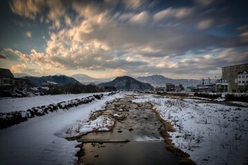 sunset over the river in winter
