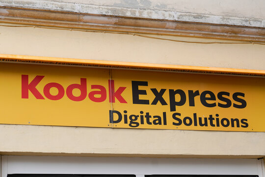 Kodak Express digital solutions store logo text and brand sign developing shop photographs photographic works