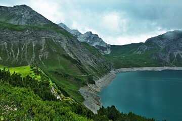 Fototapeta na wymiar Austrian Alps-view of the lake Lunersee and mountains Ratikon