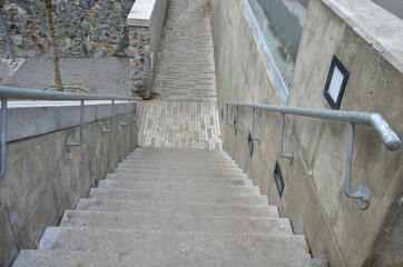 wheelchair ramp and stairs on the other side. height differences are tastefully and functionally...