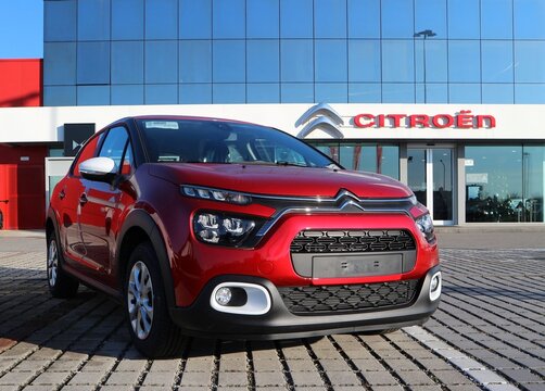 Tavagnacco, Italy. December 20, 2021. New red Citroen C3 in exhibition outside the official dealer of the french automaker. Front view.	