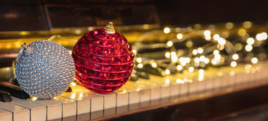 Christmas Piano music and Xmas lights bokeh background.