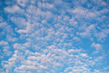 Blue sky with clouds. Natural graphic concept.